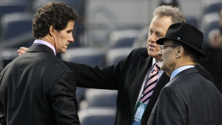 Oct 13, 2012; Bronx, NY, USA; MLB vice president of baseball operations Joe Torre (right) talks with New York Yankees former player Paul O'Neill (left) and broadcaster Michael Kay before game one of the 2012 ALCS against the Detroit Tigers at Yankee Stadium.  Mandatory Credit: Brad Penner-USA TODAY Sports