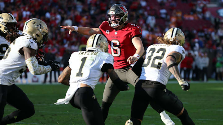 Tampa Bay Buccaneers quarterback Baker Mayfield (6) throws under pressure from the New Orleans Saints Tampa Bay Buccaneers quarterback Baker Mayfield (6) throws under pressure from the New Orleans Saints