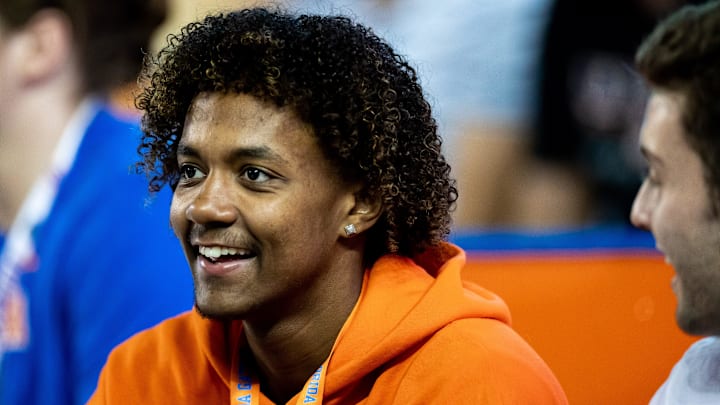 Florida Gators recruit Jaden Rashada smiles on the sideline during the second half against the