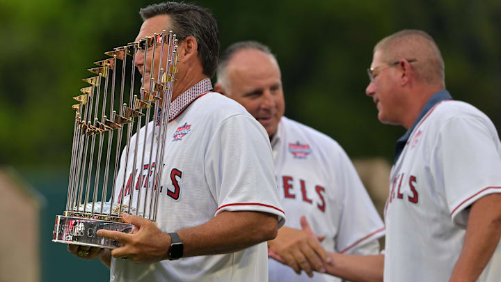 Jun 22, 2022; Anaheim, California, USA; Former Los Angeles Angels Tim Salmon holds the 2002 World Series trophy during a pregame ceremony celebrating the 20th anniversary of the World Series title at Angel Stadium. Mandatory Credit: Jayne Kamin-Oncea-Imagn Images Jun 22, 2022; Anaheim, California, USA; Former Los Angeles Angels Tim Salmon holds the 2002 World Series trophy during a pregame ceremony celebrating the 20th anniversary of the World Series title at Angel Stadium. Mandatory Credit: Jayne Kamin-Oncea-Imagn Images