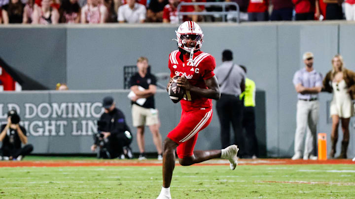 Aug 28, 2025; Raleigh, North Carolina, USA; North Carolina State Wolfpack quarterback CJ Bailey (11) runs with the ball during the second half of the game against East Carolina Pirates at Carter-Finley Stadium. Mandatory Credit: Jaylynn Nash-Imagn Images Aug 28, 2025; Raleigh, North Carolina, USA; North Carolina State Wolfpack quarterback CJ Bailey (11) runs with the ball during the second half of the game against East Carolina Pirates at Carter-Finley Stadium. Mandatory Credit: Jaylynn Nash-Imagn Images