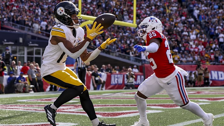 Sep 21, 2025; Foxborough, Massachusetts, USA; Pittsburgh Steelers wide receiver Calvin Austin III (19) scores the winning touchdown during the fourth quarter at Gillette Stadium. Mandatory Credit: Paul Rutherford-Imagn Images
