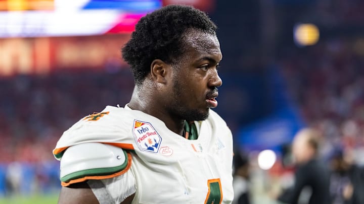 Jan 8, 2026; Glendale, AZ, USA; Miami Hurricanes defensive lineman Rueben Bain Jr. (4) against the Mississippi Rebels during the 2026 Fiesta Bowl and semifinal game of the College Football Playoff at State Farm Stadium. Mandatory Credit: Mark J. Rebilas-Imagn Images