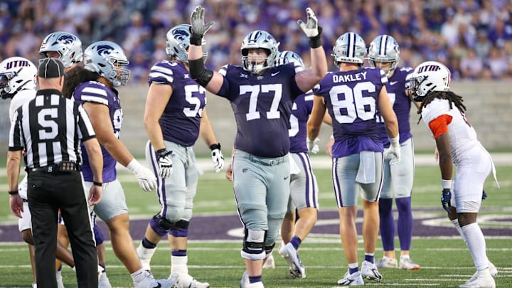 Aug 31, 2024; Manhattan, Kansas, USA; Kansas State Wildcats offensive lineman Carver Willis (77) celebrates a field goal during the third quarter against the Tennessee-Martin Skyhawks at Bill Snyder Family Football Stadium. Mandatory Credit: Scott Sewell-Imagn Images