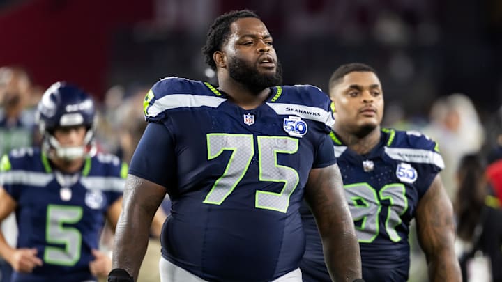 Sep 25, 2025; Glendale, Arizona, USA; Seattle Seahawks guard Anthony Bradford (75) against the Arizona Cardinals at State Farm Stadium. Mandatory Credit: Mark J. Rebilas-Imagn Images