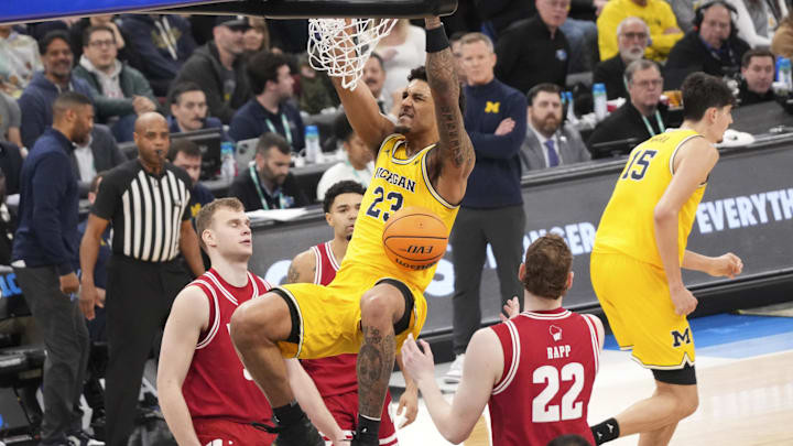 Mar 14, 2026; Chicago, IL, USA; Michigan Wolverines forward Yaxel Lendeborg (23) dunks the ball against the Wisconsin Badgers during the second half at United Center. Mandatory Credit: David Banks-Imagn Images Mar 14, 2026; Chicago, IL, USA; Michigan Wolverines forward Yaxel Lendeborg (23) dunks the ball against the Wisconsin Badgers during the second half at United Center. Mandatory Credit: David Banks-Imagn Images