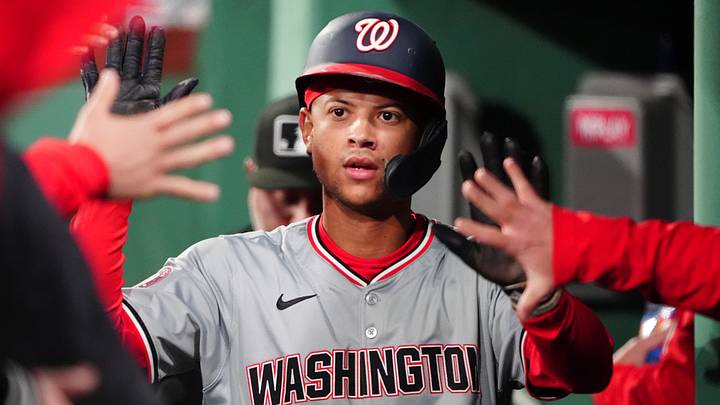 May 10, 2024; Boston, Massachusetts, USA; Washington Nationals third baseman Trey Lipscomb (38) his congratulated by teammates for scoring a run against the Boston Red Sox during the ninth inning at Fenway Park. Mandatory Credit: Gregory Fisher-USA TODAY Sports