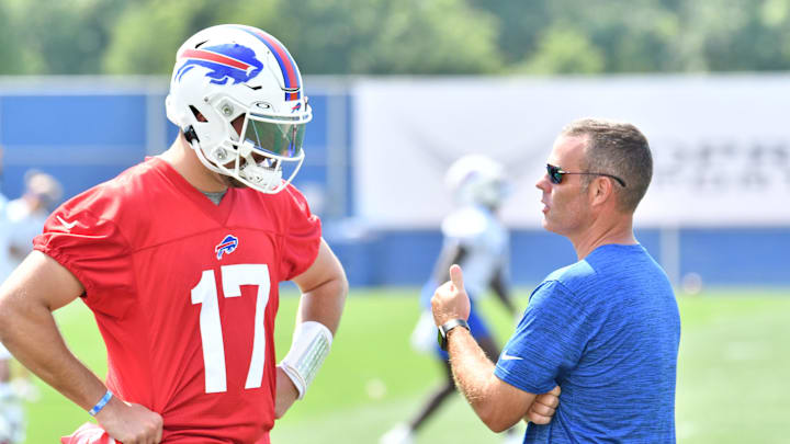 Jul 28, 2021; Orchard Park, NY, United States; Buffalo Bills general manager Brandon Beane has a word with quarterback Josh Allen (17) after practice at the Buffalo Bills Training Facility. Mandatory Credit: Mark Konezny-Imagn Images