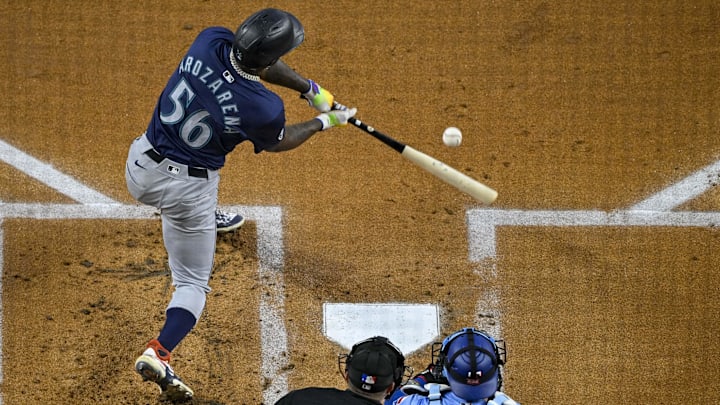 Seattle Mariners left fielder Randy Arozarena hits during a game against the Texas Rangers on Sept. 22 at Globe Life Field. Seattle Mariners left fielder Randy Arozarena hits during a game against the Texas Rangers on Sept. 22 at Globe Life Field.