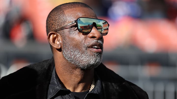 Dec 21, 2025; Cleveland, Ohio, USA; Legendary football and baseball player and father of Cleveland Browns quarterback Shedeur Sanders, Deion Sanders on the sidelines prior to a game against the Buffalo Bills at Huntington Bank Field. Dec 21, 2025; Cleveland, Ohio, USA; Legendary football and baseball player and father of Cleveland Browns quarterback Shedeur Sanders, Deion Sanders on the sidelines prior to a game against the Buffalo Bills at Huntington Bank Field.