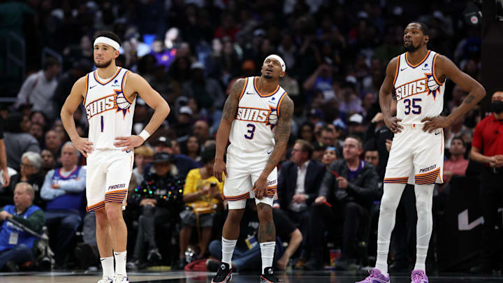 Jan 8, 2024; Los Angeles, California, USA;  Phoenix Suns guard Devin Booker (1) and guard Bradley Beal (3) and forward Kevin Durant (35) stands on the floor during the fourth quarter against the Los Angeles Clippers at Crypto.com Arena. Mandatory Credit: Kiyoshi Mio-Imagn Images