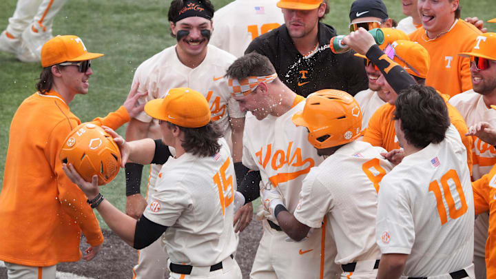 Tennessee's Stone Lawless is sprayed with water by Chris Newstrom in celebration after Lawless' walk-off home run against St. Bonaventure during an NCAA college baseball game on Sunday, March 9, 2025, in Knoxville, Tenn.