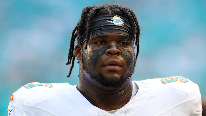 Sep 14, 2025; Miami Gardens, Florida, USA; Miami Dolphins defensive tackle Kenneth Grant (90) looks on before a game against the New England Patriots at Hard Rock Stadium. Mandatory Credit: Nathan Ray Seebeck-Imagn Images