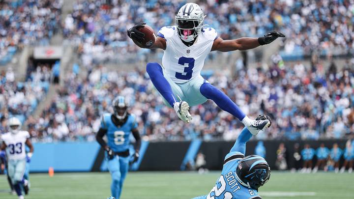 Dallas Cowboys wide receiver George Pickens and Carolina Panthers safety Nick Scott. Dallas Cowboys wide receiver George Pickens and Carolina Panthers safety Nick Scott.