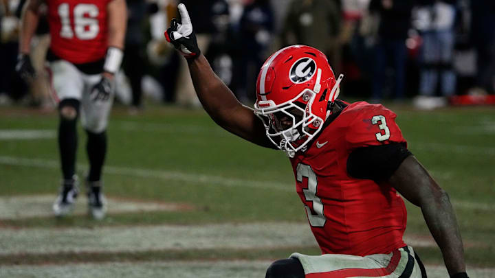 Georgia running back Nate Frazier (3) celebrates after driving in for the game winning score during overtime of a NCAA college football game against Georgia Tech in Athens, Ga., on Friday, Nov. 29, 2024. Georgia running back Nate Frazier (3) celebrates after driving in for the game winning score during overtime of a NCAA college football game against Georgia Tech in Athens, Ga., on Friday, Nov. 29, 2024.