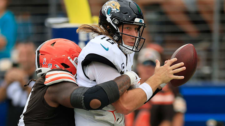 Cleveland Browns defensive end Alex Wright (91) sacks Jacksonville Jaguars quarterback Trevor Lawrence (16) in the end zone for a safety during the fourth quarter of an NFL football matchup Sunday, Sept. 15, 2024 at EverBank Stadium in Jacksonville, Fla. The Browns defeated the Jaguars 18-13. [Corey Perrine/Florida Times-Union]