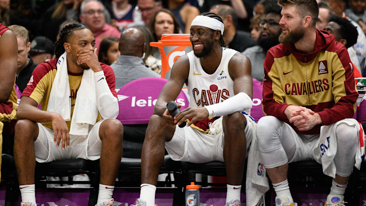 Oct 26, 2024; Washington, District of Columbia, USA; Cleveland Cavaliers guard Caris LeVert (3), guard Darius Garland (10), and forward Dean Wade (32) look on from the bench during the fourth quarter against the Washington Wizards at Capital One Arena. Mandatory Credit: Reggie Hildred-Imagn Images