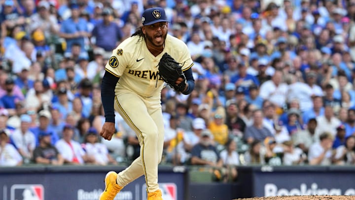 Oct 4, 2025; Milwaukee, Wisconsin, USA; Milwaukee Brewers starting pitcher Freddy Peralta (51) reacts after striking out Chicago Cubs second baseman Nico Hoerner (not pictured) during the fifth inning of game one of the NLDS round for the 2025 MLB playoffs at American Family Field. Mandatory Credit: Benny Sieu-Imagn Images