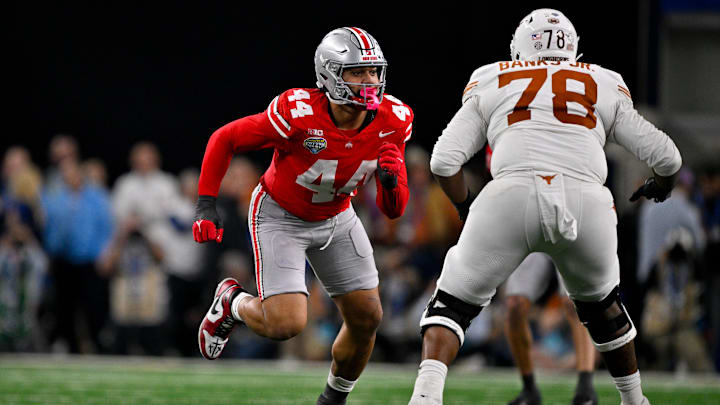 Jan 10, 2025; Arlington, TX, USA; Ohio State Buckeyes defensive end JT Tuimoloau (44) and Texas Longhorns offensive lineman Kelvin Banks Jr. (78) in action during the game between the Texas Longhorns and the Ohio State Buckeyes at AT&T Stadium. Mandatory Credit: Jerome Miron-Imagn Images
