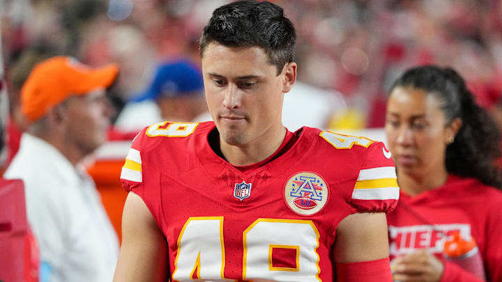 Aug 22, 2024; Kansas City, Missouri, USA; Kansas City Chiefs punter Matt Araiza (49) on the sidelines against the Chicago Bears during the game at GEHA Field at Arrowhead Stadium. Mandatory Credit: Denny Medley-Imagn Images