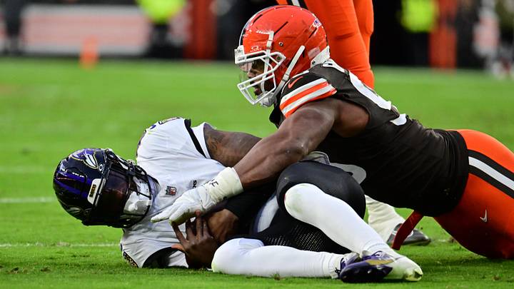 Nov 16, 2025; Cleveland, Ohio, USA; Baltimore Ravens quarterback Lamar Jackson (8) is sacked by Cleveland Browns defensive end Myles Garrett (95) during the first quarter at Huntington Bank Field. Mandatory Credit: Ken Blaze-Imagn Images Nov 16, 2025; Cleveland, Ohio, USA; Baltimore Ravens quarterback Lamar Jackson (8) is sacked by Cleveland Browns defensive end Myles Garrett (95) during the first quarter at Huntington Bank Field. Mandatory Credit: Ken Blaze-Imagn Images