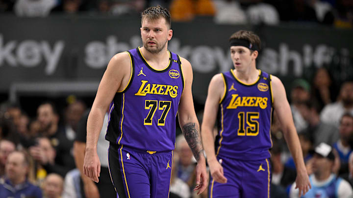 Apr 9, 2025; Dallas, Texas, USA: Los Angeles Lakers guard Luka Doncic (77) and guard Austin Reaves (15) during the game between the Dallas Mavericks and the Los Angeles Lakers at American Airlines Center. Mandatory Credit: Jerome Miron-Imagn Images Apr 9, 2025; Dallas, Texas, USA: Los Angeles Lakers guard Luka Doncic (77) and guard Austin Reaves (15) during the game between the Dallas Mavericks and the Los Angeles Lakers at American Airlines Center. Mandatory Credit: Jerome Miron-Imagn Images