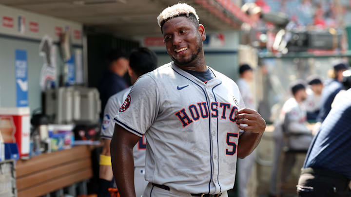 Sep 15, 2024; Anaheim, California, USA;  Houston Astros starting pitcher Ronel Blanco (56) smiles in the dugout after pitching during the sixth inning against the Los Angeles Angels at Angel Stadium.