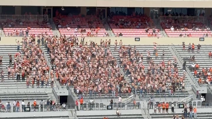 A swath of shitless fans took over an empty section of stadium during Oklahoma State's loss on Saturday.