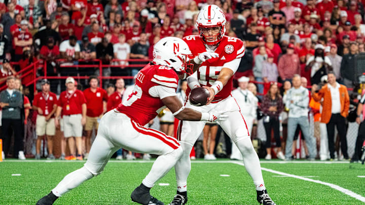 Sep 7, 2024; Lincoln, Nebraska, USA; Nebraska Cornhuskers quarterback Dylan Raiola (15) hands the ball off to running back Dante Dowdell (23) during the third quarter against the Colorado Buffaloes at Memorial Stadium.
