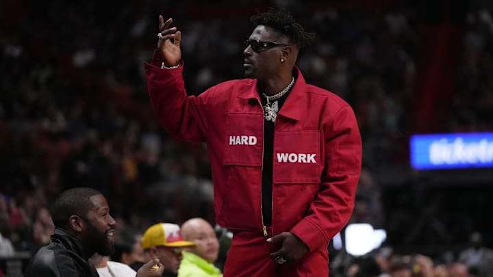 Former NFL wide receiver Antonio Brown was detained by police outside a celebrity boxing event early Saturday morning.