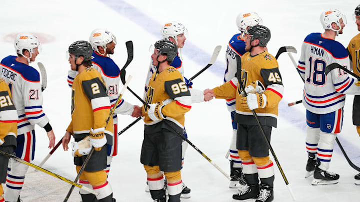 Vegas Golden Knights players shake hands with Edmonton Oilers players after the Oilers defeated the Vegas Golden Knights 1-0 during an overtime period, completing a 4-1 series win