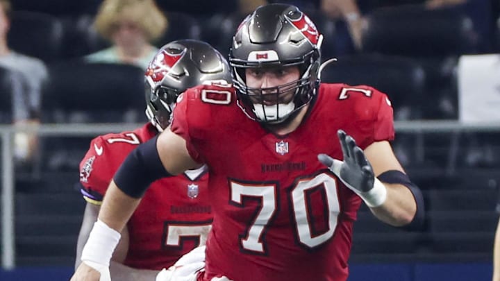 Sep 11, 2022; Arlington, Texas, USA;  Tampa Bay Buccaneers offensive tackle Robert Hainsey (70) in action during the game against the Dallas Cowboys at AT&T Stadium. Mandatory Credit: Kevin Jairaj-Imagn Images