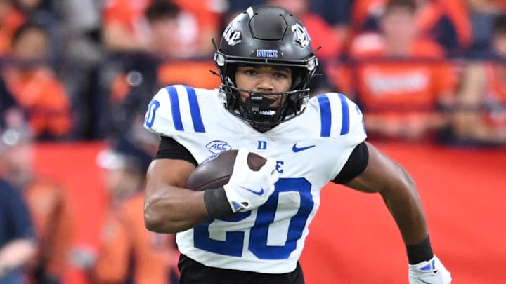 Sep 27, 2025; Syracuse, New York, USA; Duke Blue Devils running back Nate Sheppard (20) carries the ball in the second quarter against the Syracuse Orange at the JMA Wireless Dome. Mandatory Credit: Mark Konezny-Imagn Images Sep 27, 2025; Syracuse, New York, USA; Duke Blue Devils running back Nate Sheppard (20) carries the ball in the second quarter against the Syracuse Orange at the JMA Wireless Dome. Mandatory Credit: Mark Konezny-Imagn Images