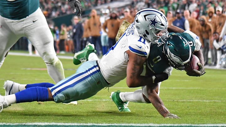 Nov 5, 2023; Philadelphia, Pennsylvania, USA; Dallas Cowboys linebacker Micah Parsons (11) stops Philadelphia Eagles running back D'Andre Swift (0) short of the goal line during the second quarter at Lincoln Financial Field. Mandatory Credit: Eric Hartline-Imagn Images