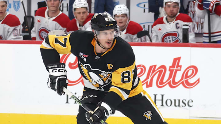 Dec 21, 2025; Pittsburgh, Pennsylvania, USA;  Pittsburgh Penguins center Sidney Crosby (87) skates with the puck in a shootout against the Montréal Canadien at PPG Paints Arena. Mandatory Credit: Charles LeClaire-Imagn Images