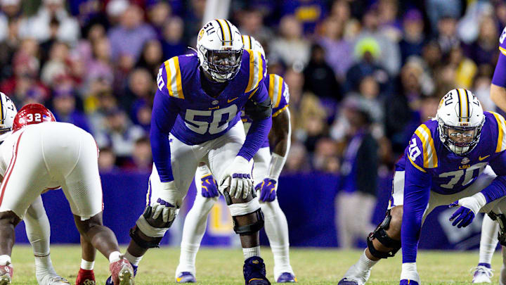 LSU Tigers offensive lineman Emery Jones Jr. defends the line against Oklahoma Sooners defensive lineman Mason Thomas.