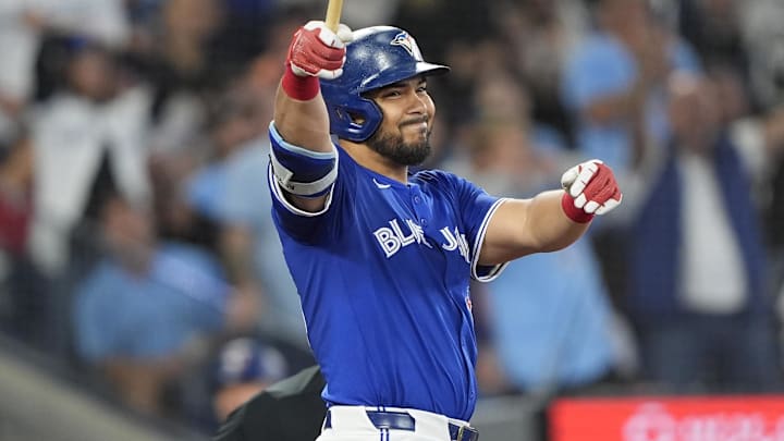 Toronto Blue Jays left fielder Anthony Santander grimaces after taking a swing. 