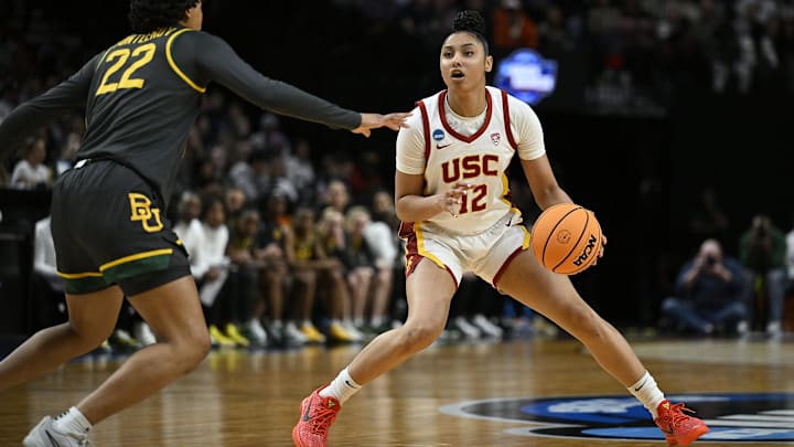 Mar 30, 2024; Portland, OR, USA; USC Trojans guard JuJu Watkins (12) steps back during the second half against Baylor Lady Bears guard Bella Fontleroy (22) in the semifinals of the Portland Regional of the 2024 NCAA Tournament at the Moda Center. Mandatory Credit: Troy Wayrynen-Imagn Images Mar 30, 2024; Portland, OR, USA; USC Trojans guard JuJu Watkins (12) steps back during the second half against Baylor Lady Bears guard Bella Fontleroy (22) in the semifinals of the Portland Regional of the 2024 NCAA Tournament at the Moda Center. Mandatory Credit: Troy Wayrynen-Imagn Images