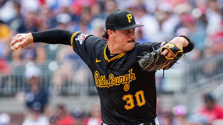 Jun 29, 2024; Cumberland, Georgia, USA; Pittsburgh Pirates pitcher Paul Skenes (30) pitches the ball against Atlanta Braves during the fifth inning at Truist Park. Mandatory Credit: Jordan Godfree-USA TODAY Sports