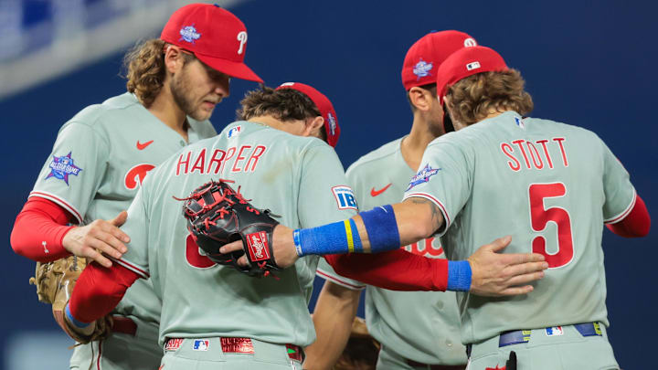 May 4, 2026; Miami, Florida, USA; Philadelphia Phillies first baseman Bryce Harper (3) celebrates with teammates after the game against the Miami Marlins at loanDepot Park.