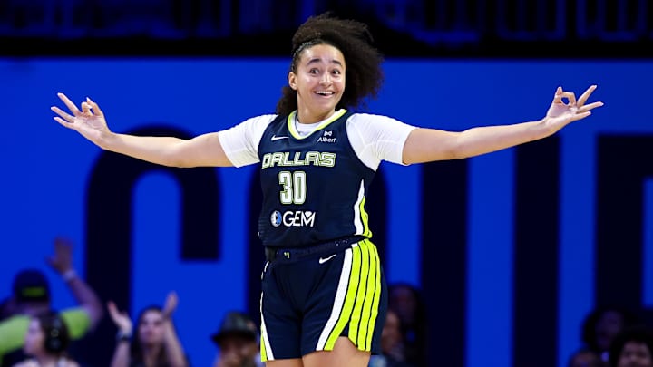 Jul 30, 2025; Arlington, Texas, USA;  Dallas Wings guard Haley Jones (30) celebrates after scoring against the Atlanta Dream during the second half at College Park Center. Mandatory Credit: Kevin Jairaj-Imagn Images