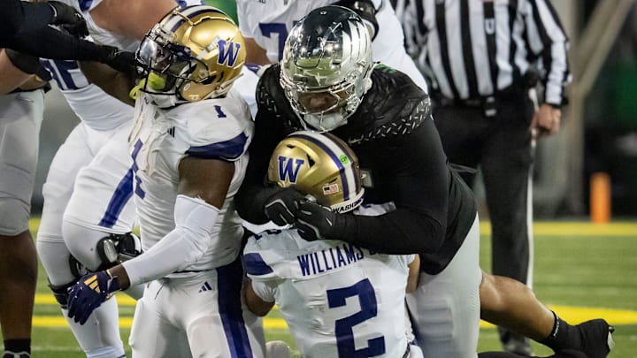 Oregon defensive lineman Derrick Harmon sacks Washington quarterback Demond Williams Jr. as the No. 1 Oregon Ducks host the Washington Huskies Saturday, Nov. 30, 2024 at Autzen Stadium in Eugene, Ore.