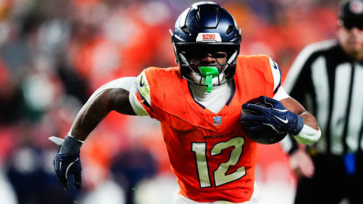 Dec 14, 2025; Denver, Colorado, USA; Denver Broncos running back RJ Harvey (12) runs for a gain during the third quarter against the Green Bay Packers at Empower Field at Mile High. Dec 14, 2025; Denver, Colorado, USA; Denver Broncos running back RJ Harvey (12) runs for a gain during the third quarter against the Green Bay Packers at Empower Field at Mile High.