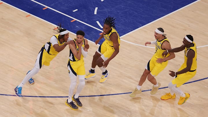 May 21, 2025; New York, New York, USA; Indiana Pacers guard Tyrese Haliburton (0) celebrates with teammates after tying the game in the fourth quarter to send the game to overtime against the New York Knicks during game one of the eastern conference finals for the 2025 NBA Playoffs at Madison Square Garden. Mandatory Credit: Brad Penner-Imagn Images