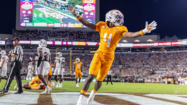 Sep 27, 2025; Starkville, Mississippi, USA; Tennessee Volunteers wide receiver Mike Matthews (4) reacts after winning the game against the Mississippi State Bulldogs at Davis Wade Stadium at Scott Field. Mandatory Credit: Wesley Hale-Imagn Images