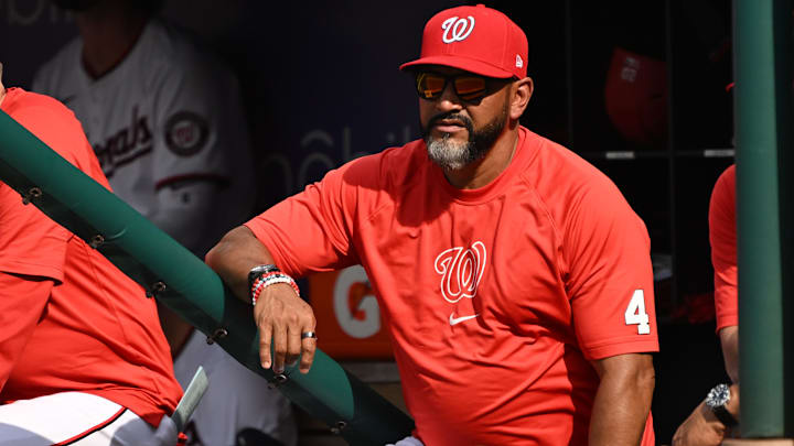 Jul 8, 2024; Washington, District of Columbia, USA; Washington Nationals manager Dave Martinez (4) watches from the dugout against the St. Louis Cardinals during the fifth inning at Nationals Park
