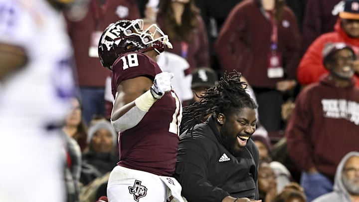 Nov 26, 2022; College Station, Texas, USA;  Texas A&M Aggies tight end Donovan Green (18) celebrates his touchdown during the second quarter against the LSU Tigers at Kyle Field. Mandatory Credit: Maria Lysaker-USA TODAY Sports