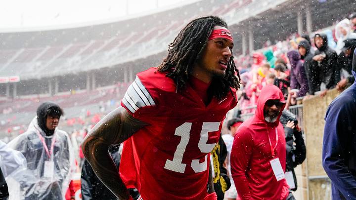 Wide receiver Chris Henry Jr. (15) walks off the field in the rain after the Ohio State football spring game at Ohio Stadium on Saturday, April 18, 2026 in Columbus, Ohio. Wide receiver Chris Henry Jr. (15) walks off the field in the rain after the Ohio State football spring game at Ohio Stadium on Saturday, April 18, 2026 in Columbus, Ohio.