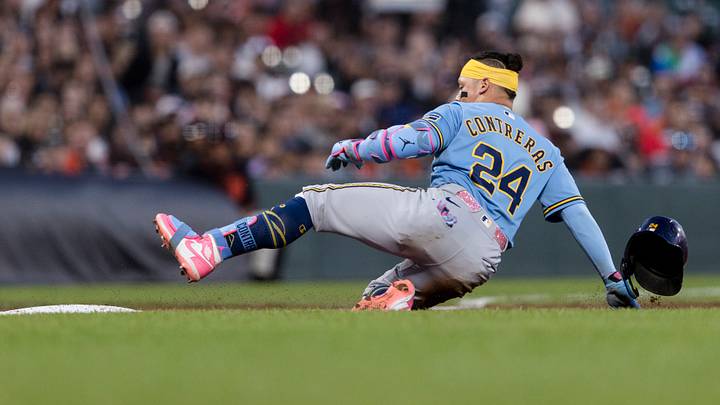 Jul 28, 2026; San Francisco, California, USA;  Milwaukee Brewers catcher William Contreras (24) slides into third base for a triple against the San Francisco Giants during the fifth inning at Oracle Park. Mandatory Credit: John Hefti-Imagn Images