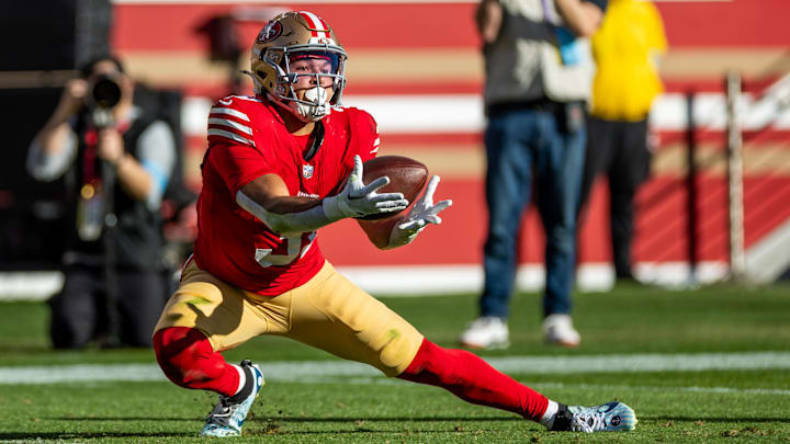 Dec 8, 2024; Santa Clara, California, USA; San Francisco 49ers running back Isaac Guerendo (31) catches a long pass during the first quarter against the Chicago Bears at Levi's Stadium. Mandatory Credit: Bob Kupbens-Imagn Images